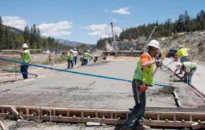 Workers form new concrete on a segment of Interstate 80 near Emigrant Gap and Cisco Grove. Photo/Caltrans
