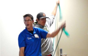 Alan Barichievich, front, demonstrates shoulder exercises. Photo/LTN