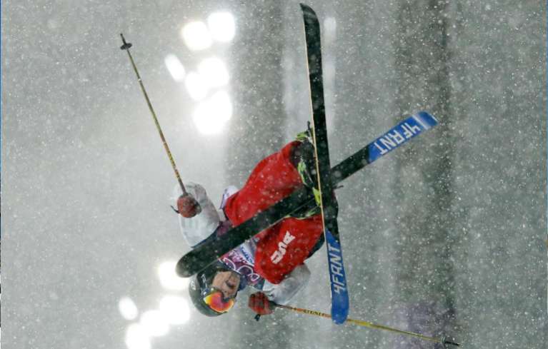David Wise of the United States gets air during the men's ski halfpipe final at the Rosa Khutor Extreme Park, at the 2014 Winter Olympics, Tuesday, Feb. 18, 2014, in Krasnaya Polyana, Russia. (AP Photo/Sergei Grits)
