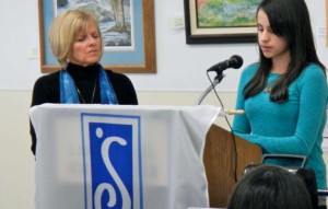 Alexis Andersen talks about teen curfews while Soroptimist Wendy David listens. Photo/LTN