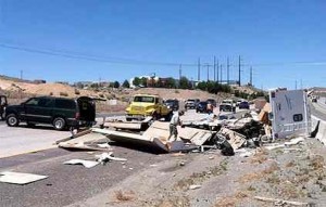 A Zephyr Cove couple's trailer is destroyed after flipping on Highway 395 as they headed home Memorial Day. Photo/Provided