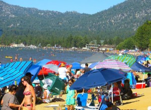 Throngs of people line the beaches of Lake Tahoe on July 4. Photo/Howie Nave