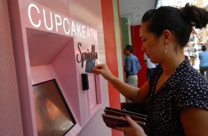 Veronica Wong buys cupcakes from an ATM in New York. Photo/LTN