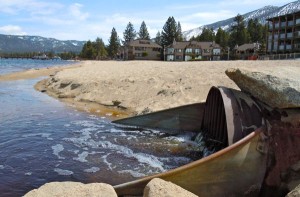 Water from the Bijou area drains from a large pipe right into Lake Tahoe. Photo/LTN file