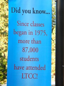 Informational signs are scattered throughout the campus.