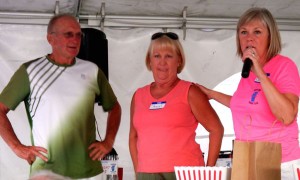 Zephyr Cove Tennis Club Foundation President Carolyn Wright, right, honors Tahoe Tennis Classic founders Hersch and Sheryl Herschmann.