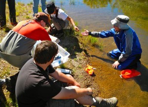 Working on the project are, clockwise from right, Mason Bindl, Cody Bear, Phil Metting Van Rijan, and Erin Miller.