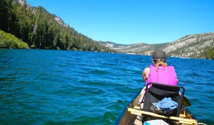 Sue at the helm of the canoe.