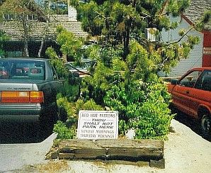 A sign used to separate the two parking lots. Photos/Bill Kingman