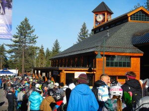 Nearly 200 people wait for the gondola to open to signal the start of the 2014-15 season.