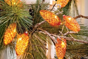 Greenery combined with decorative LED lights can brighten up holiday centerpieces and mantle displays. Photo/ Gardener’s Supply Company