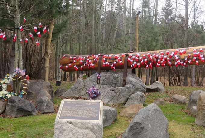 The Children's Memorial in South Lake Tahoe is awash in the Christmas spirit. An anonymous Santa decorated the site with stockings. Photo/Provided