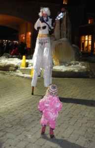 Shailee Palmer, 2, of Chico is mesmerized by the super tall woman. Photo/Kathryn Reed
