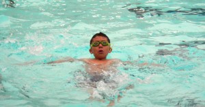 Hugo Perez practices floating on his back.