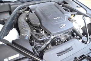 Specs and Techs Price $39,450 to about $55,000 Engines 3.8L DOHC 24 valve V-6 311 hp@ 6,000rpm 293 lb.-ft. of torque @ 5,000 rpm 5.0L DOHC 32 valve V-8 420 hp @ 6,000 rpm 383 lb.-ft. of torque @ 5,000 rpm Transmission Eight speed automatic Configuration Longitudinal front engine/Rear Wheel Drive/All Wheel Drive Dimensions Wheelbase 118.5 inches Length 196.5 inches Width 74.4 inches Height 58.3 inches Track (f/r) 64.1/65.3 inches Ground clearance 5.3 inches Weight (RWD/AWD/5.0L) 4,138/4,295/4,541 pounds Trunk capacity 15.3 cubic feet Fuel Capacity 20.3 gallons Steering lock to lock 2.55 turns Turning circle 36.2 feet Wheels (3.8/5.0) 18X8/19X8.5f; 19X9r inches Tires (3.8/5.0) 245/45X18/245/40X19f; 275/35X19r Cabin volume 107.7 cubic feet Coefficient of drag 0.26 Performance 0-60 mph 5.89 seconds 50-70 mph level 2.97 seconds, uphill 3.86 seconds Top speed electronically limited to 149 mph Fuel economy EPA rated at 18/29/22 mpg combined. Expect 22-25 mpg in suburban/rural driving. 32-33 mpg on a level highway at 70 mph.