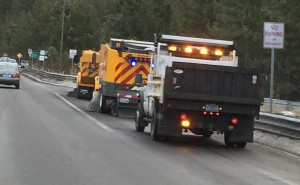 NDOT street sweepers remove salt and sand from roadways within four days of storm end in urban areas, dependent on weather. Photo/Kathryn Reed