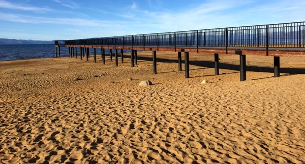 Two pilings of the Tahoe Keys pier remain in the water. Photo/Kathryn Reed