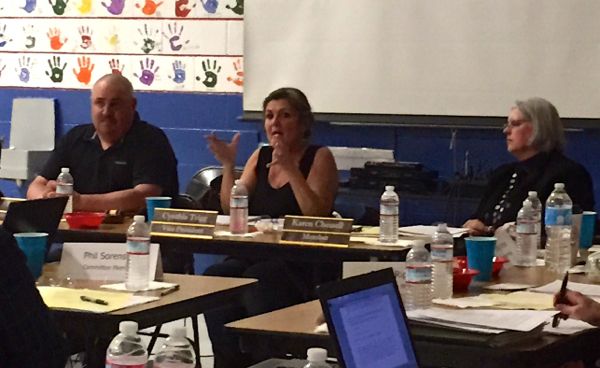 Douglas County School District board member Cindy Trigg, center, makes a point Feb. 19 as colleagues Ross Chichester and Karen Chessell listen. Board member Neil Freitas was absent Feb. 19. Photo/LTN