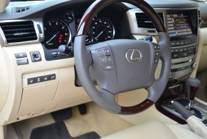 Specifications Price $82,690 to about $90,000 Engine 5.7L, DOHC, 32 valve V-8 383 hp @ 5,600 rpm 403 lbs.-ft. of torque @ 3,600 rpm Transmission Six speed electronically controlled automatic Configuration Longitudinal front engine/all wheel drive Dimensions Wheelbase 112.2 inches Length 197.0 inches Width 77.6 inches Height 75.6 inches Ground clearance 8.9 inches Track (f/r) 64.6/64.4 inches Weight 6,000 pounds GVWR 7,385 pounds Weight Distribution (f/r) 51/49 percent Towing capacity 7,000 pounds Fuel capacity 24.6 gallons Cargo capacity third row removed, second row folded 83.1 cubic feet Turning circle 38.7 feet Steering lock to lock 2.4 to 3.4 turns (at below 6mph) Wheels 20X8.5 inch alloys Tires 285/50 HR mud and snow Coefficient of drag 0.35 Performance 0-60 mph 6.89 seconds 50-70 mph 3.59 seconds 50-70 mph uphill 5.28 seconds Top Speed Electronically limited to 137 mph Fuel economy EPA rated at 12/17/14 mpg city/highway/combined. Expect 15.5 mpg in rural country driving and 20 mpg on the highway at legal speeds.