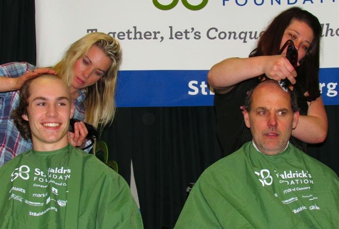 Van Oleson generously donates the Ice Arena for this event every year. And not only that, he and his son shaved their heads. When you work in a frigid environment like an ice rink, that's a sacrifice.