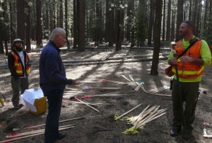Mayor Hal Cole, center, surveys the work that started April 10 at Lake Tahoe Wildlife Care's new home. Photo/Tom Millham