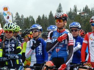 Cyclists pause for the national anthem. Photo/Kathryn Reed