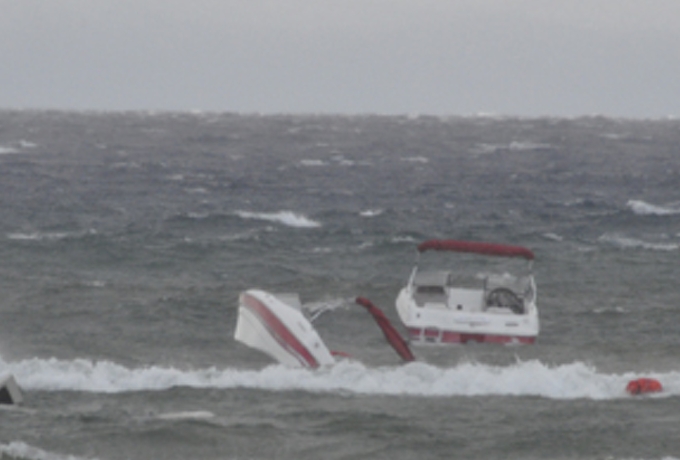 A rental boat at Camp Richardson capsizes May 7. Photo/Bob Sweatt