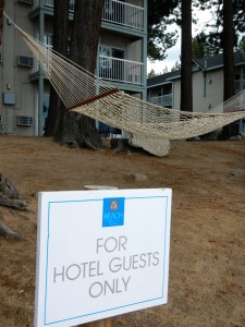 Hotel owners have strung private hammocks on the public beach.