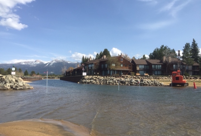 Metal poles outlining the channel leading to the Tahoe Keys Marina were put in May 5. Photo/Kathryn Reed