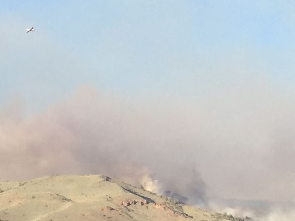 One of the many aircraft drop retardant on the Washington Fire on June 22. Photo/Susan Wood
