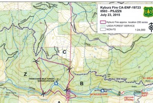 The fire area is outlined in red near the bottom of the map.