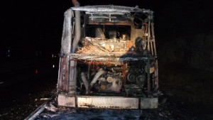 Fire completely destroyed a bus traveling on Highway 50. Photo/Provided