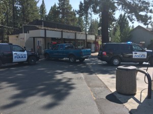 Four police cars surround the 7-Eleven in mid-South Lake Tahoe on Aug. 30. Photo/Brad Perry