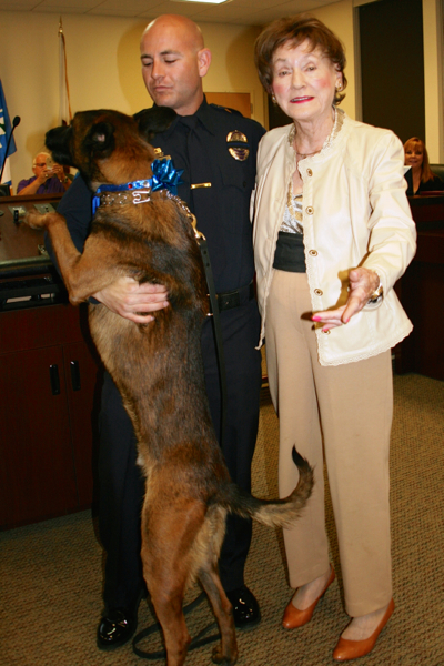 Lisa Maloff paid for Rici, SLTPD's newes dog, along with Officer Scott Crevelli to be trained as his handler. Photo/Tracy Franklin