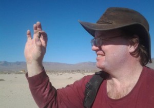 Scott Harlan of Salinas holds up a meteorite he found at Misfit Flats, southeast of Reno in Nevada. He made 19 trips to this dry lake bed and found 59 meteorites.