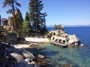 In this 2015 photo during extreme drought, Lake Tahoe water level is 3 feet below its natural rim of 6,223 feet, or about 6 feet below typical average. The water normally would be lapping at the deck chairs on that sandy alcove. Photo/Bill Kingman