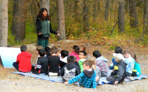 Adilene Negrete with the U.S. Forest Service teaches students about aquatic invasive species. Photo/Kathryn Reed