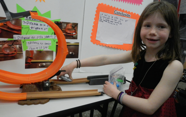 Ruby Hackett tests the best surface for a Hot Wheel to go the fastest. Photos/Kathryn Reed