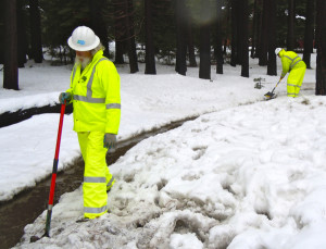 Caltrans crews in December 2010 work on a flooding issue along Highway 89. 