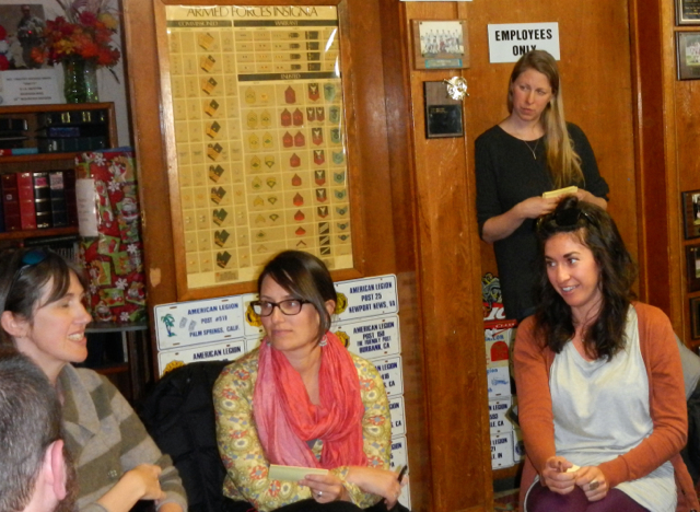 Jamie Orr, standing, listens as people discuss what they want for the future of the South Shore community. Photo/LTN