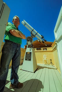 Jay Lawson in the Blair Observatory with the Carl Wells telescope in Sparks. Photo/Ryan Berendsen