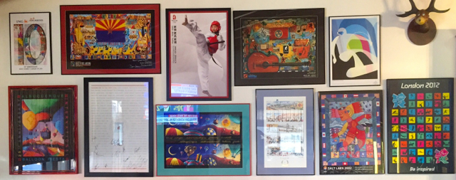 Olympic memorabilia covers the wall above Louise Feller's couch. Photo/Susan Wood