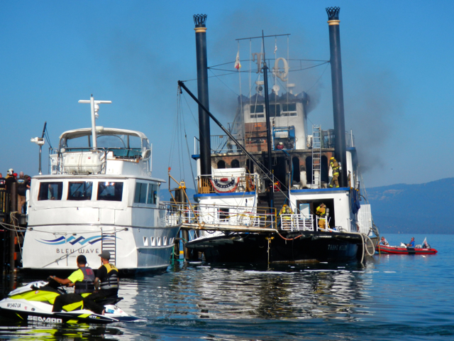 Firefighters on land and water worked to suppress the flames on the Tahoe Queen. Photo/Kathryn Reed