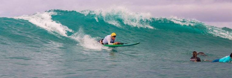 Jeff Andrews, who is disabled, doesn't let that stop him from surfing. Photo/Provided