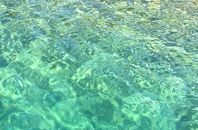 Some debris from Queen entering lake