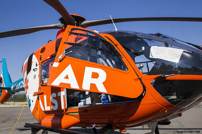 The fleet was going to change even without the merger. Calstar now uses an Airbus H135/P3, with graphics that look like its the Miami Dolphins charter. Photo Copyright 2016 Carolyn E. Wright