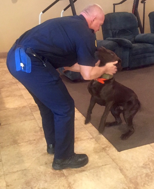 Battalion Chief Todd Moss and Gunner always training and playing.