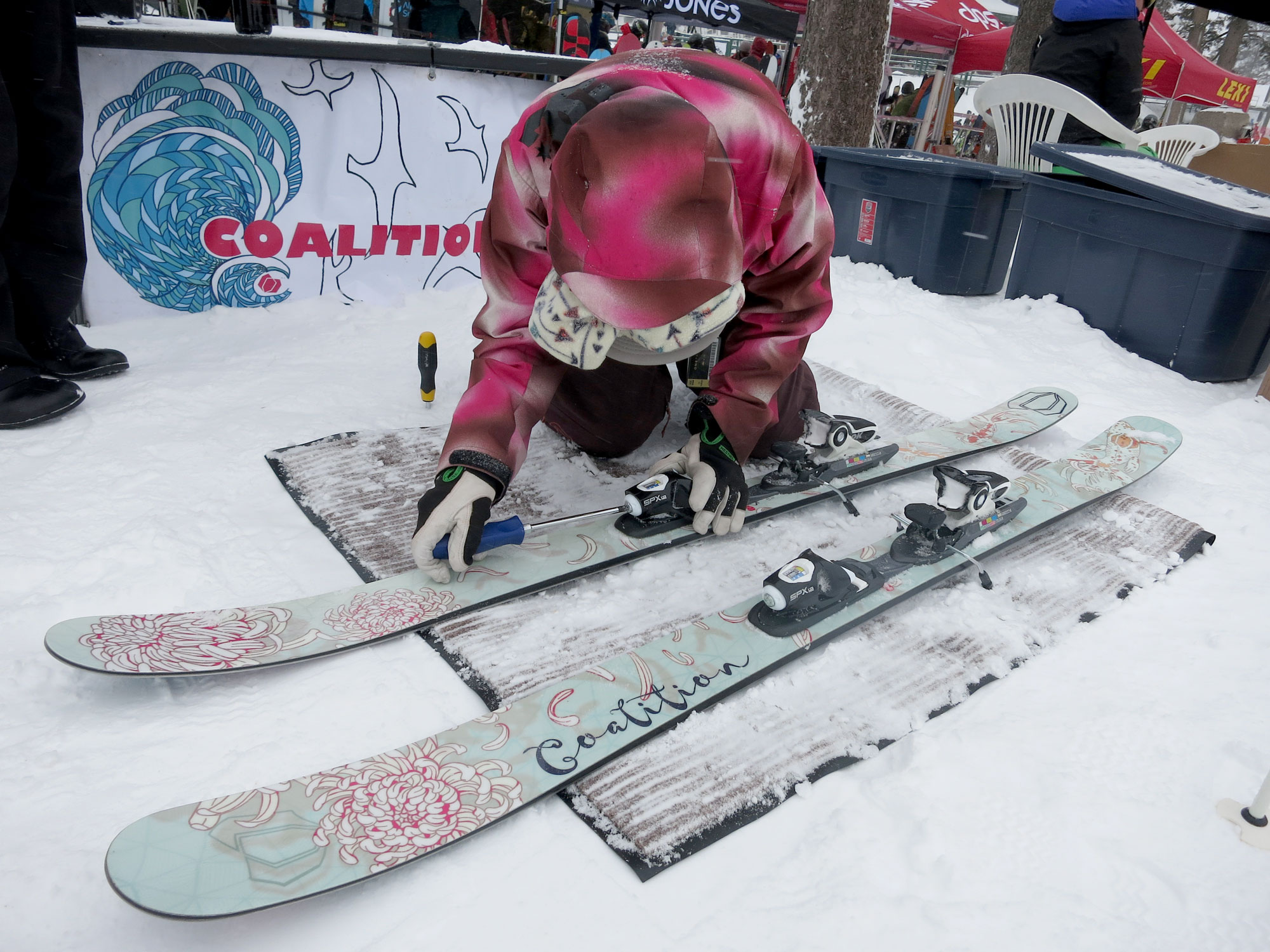 Jenn Sheridan of the women's ski and snowboard line Coalition Snow sets up a pair of SOS all-mountain skis. Photo/Jessie Marchesseau