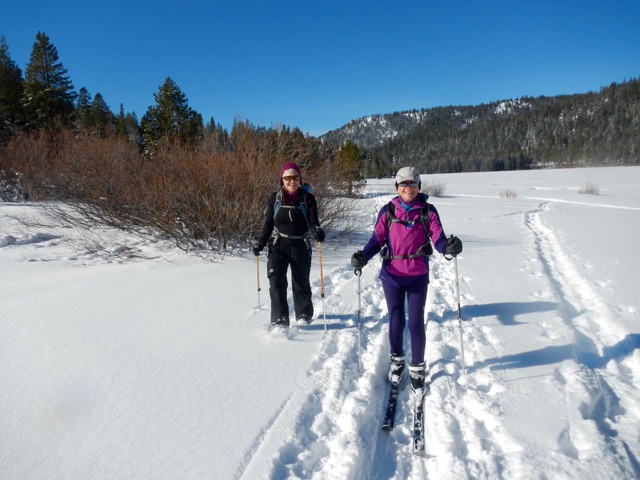 Renee and Rosemary snowshoe and cross country ski through Grass Lake on Dec. 26. Photo/Kathryn Reed