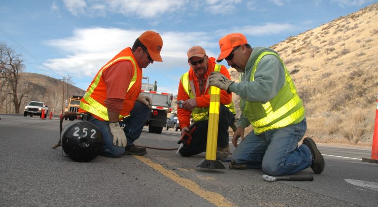 Governor signs safety bill for NDOT workers